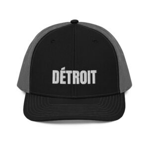 Detroit French spelling trucker hat in black and charcoal, front view
